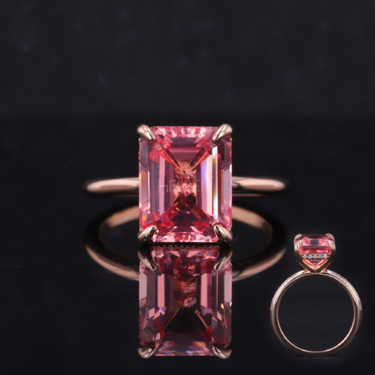 Semi-precious halo ring with pink emerald cut gemstone and fine setting