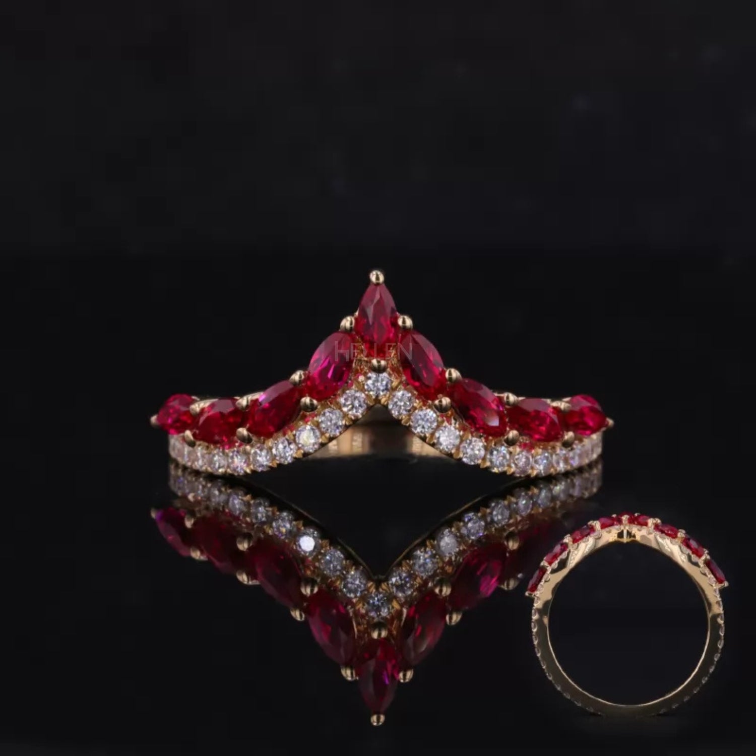 V-shaped ring with vibrant ruby gemstone and sparkling moissanite