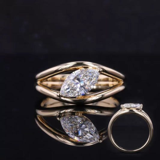 Marquise cut moissanite solitaire engagement ring with split shank design