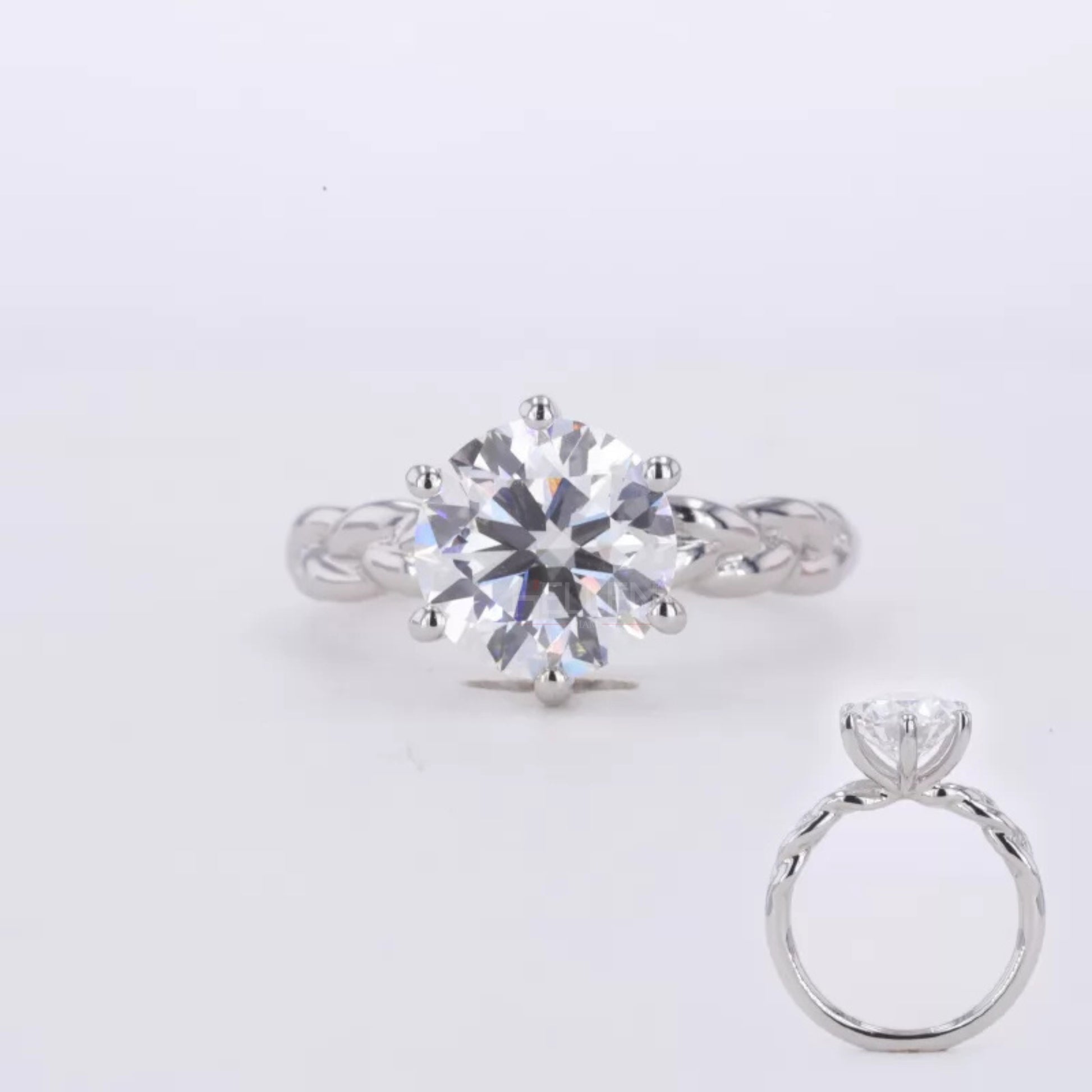 Round cut moissanite solitaire engagement ring with twisted shank – elegant blend of tradition and modern flair

