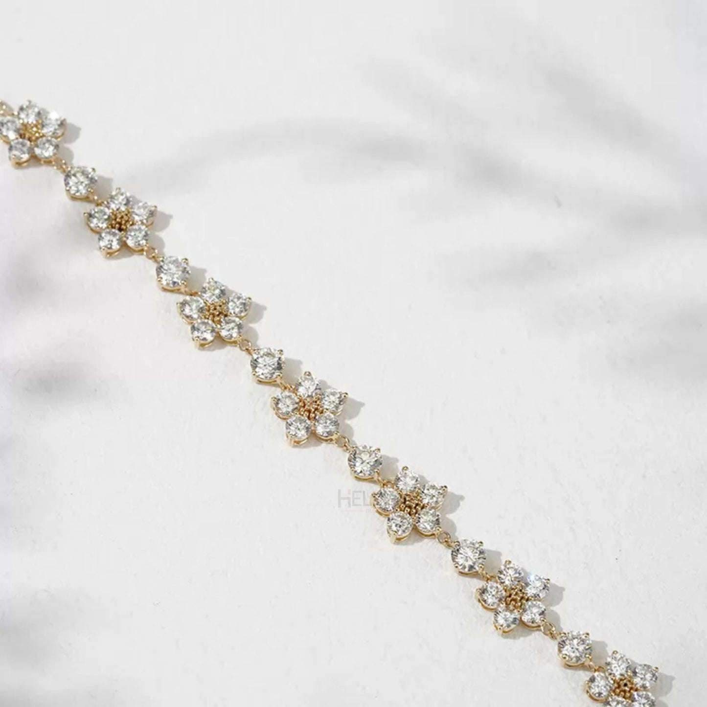Floral-inspired everyday bracelet with round cut moissanite – lightweight and elegant loose chain design

