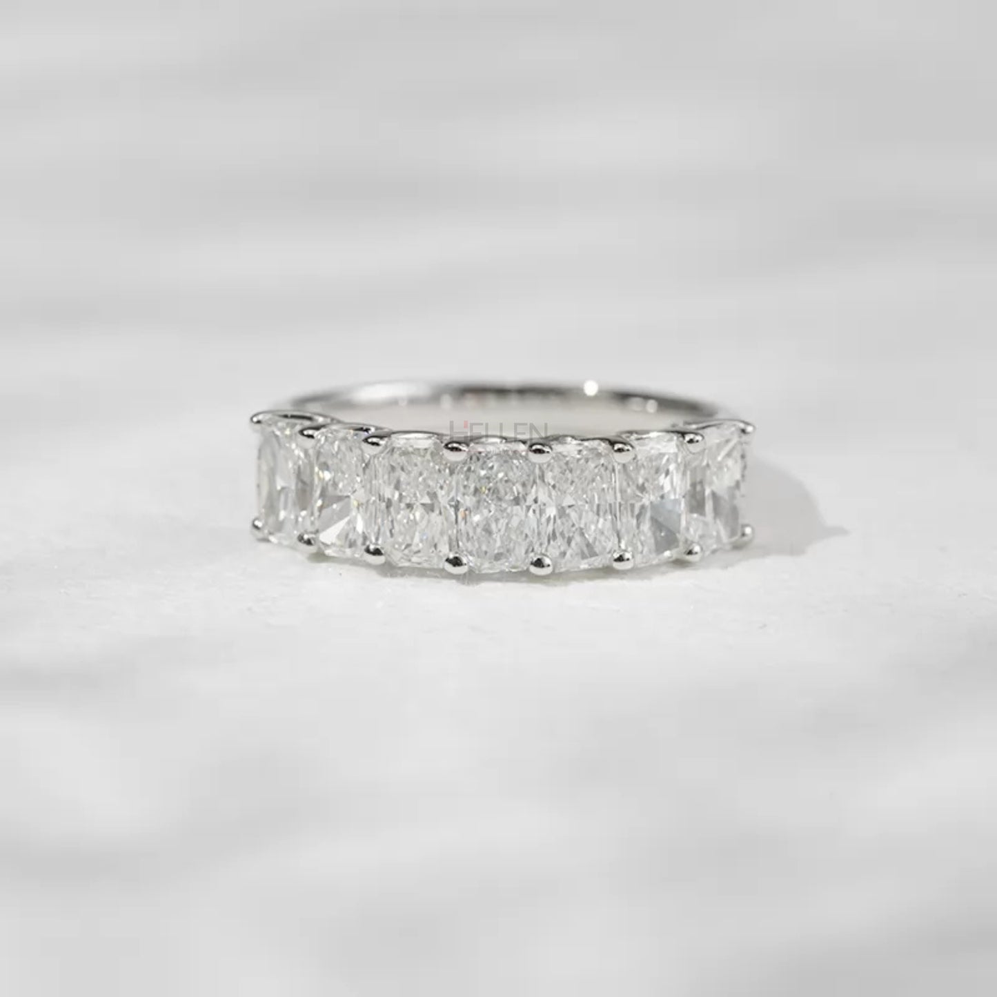 Radiant cut moissanite half eternity ring in sterling silver – modern brilliance in a sleek design