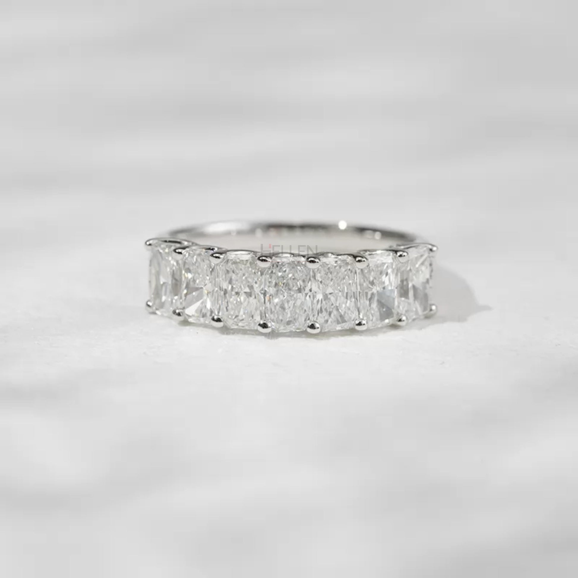 Radiant cut moissanite half eternity ring in sterling silver – modern brilliance in a sleek design