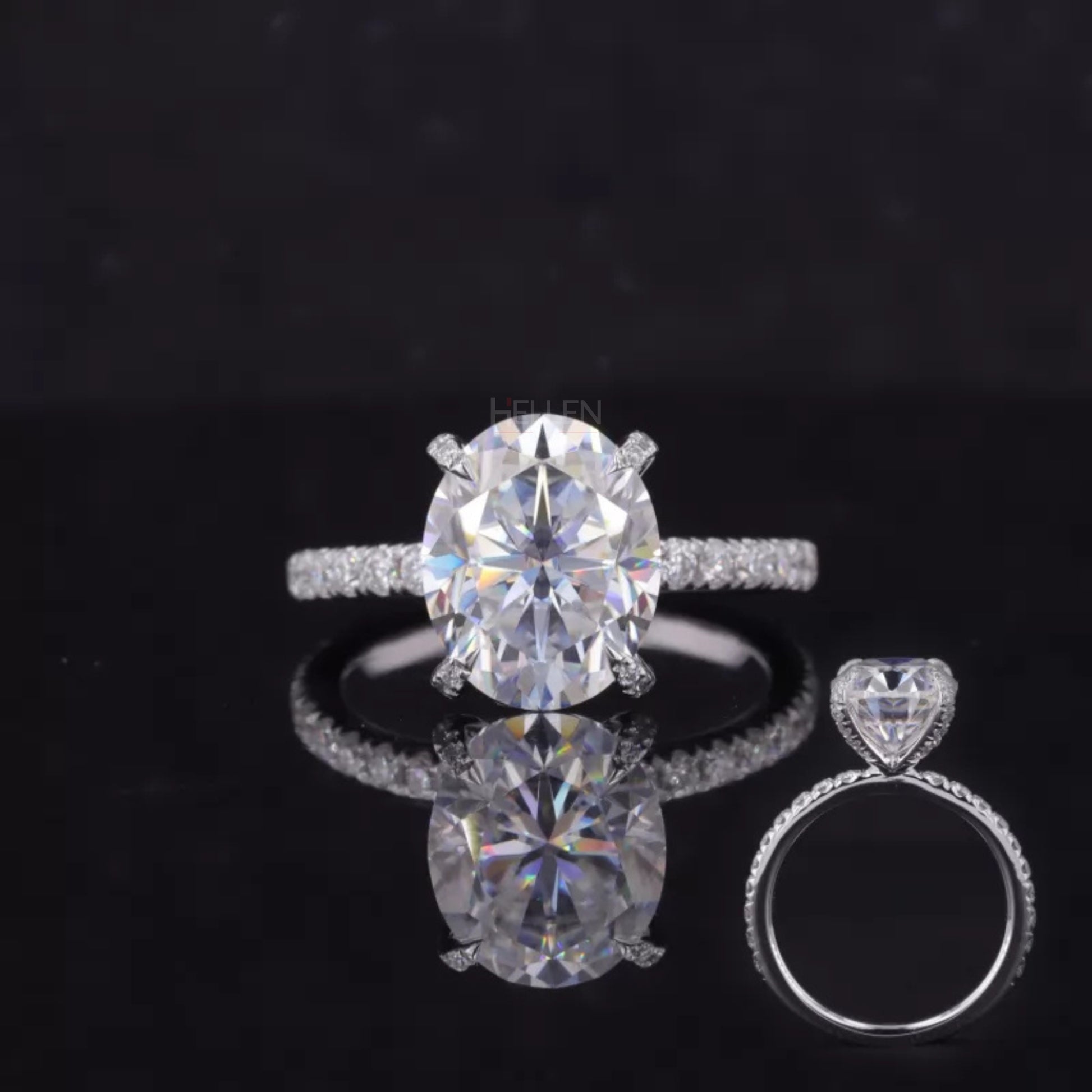 Oval cut moissanite solitaire ring with diamond accents on tiger prongs – bold and secure luxury engagement design

