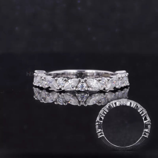 Wedding band with marquise and round moissanite stones – graceful combination of curves and brilliance

