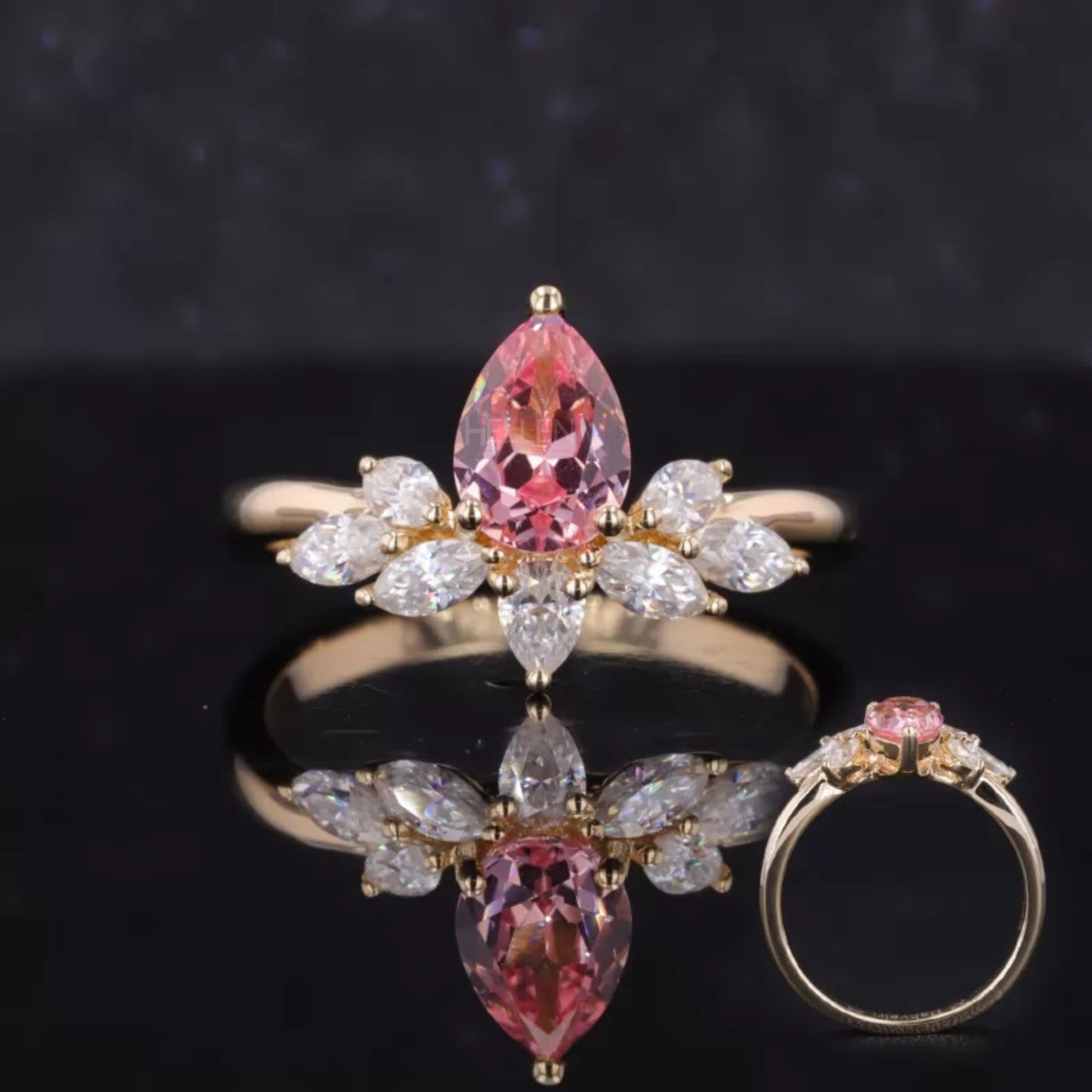 Floral-inspired proposal ring with pear cut pink sapphire and moissanite – romantic and colorful bloom design