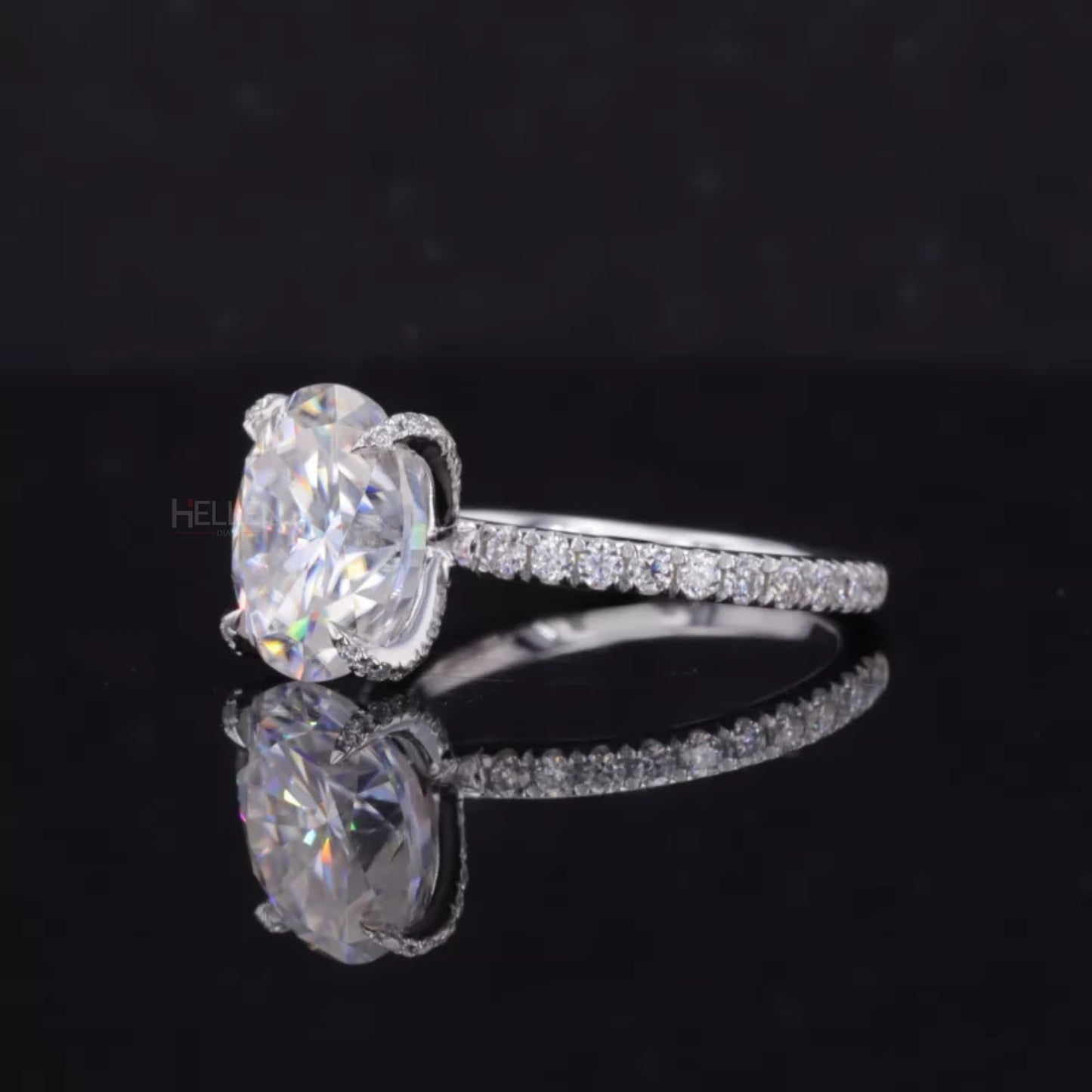 Oval Cut Moissanite Solitaire with Diamonds on Tiger Prongs Ring