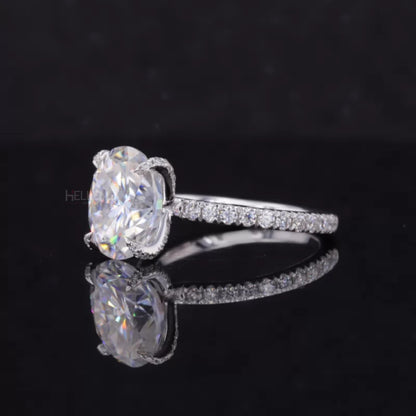 Oval Cut Moissanite Solitaire with Diamonds on Tiger Prongs Ring