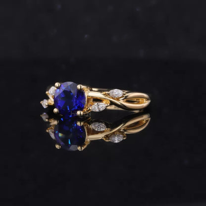 Blue Sapphire Round Cut Gemstone & Marquise Side Stone Ring