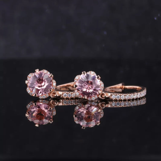 Sterling silver drop earrings featuring pink sapphire and moissanite accents