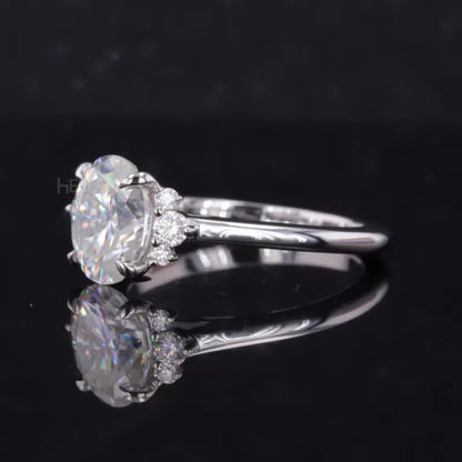 Floral Illusion Oval Cut Center & Round Side Moissanite Proposal Ring