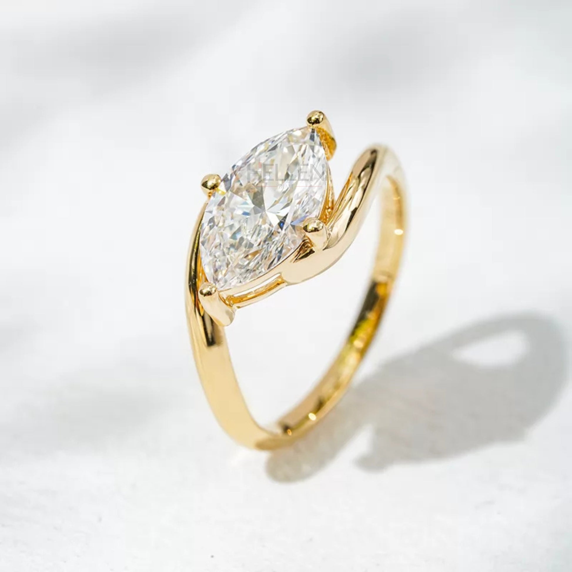 Vintage style marquise cut moissanite solitaire ring in elegant setting