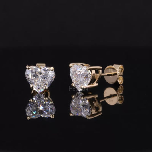 Heart-shaped solitaire moissanite studs in sterling silver – romantic and elegant everyday earrings

