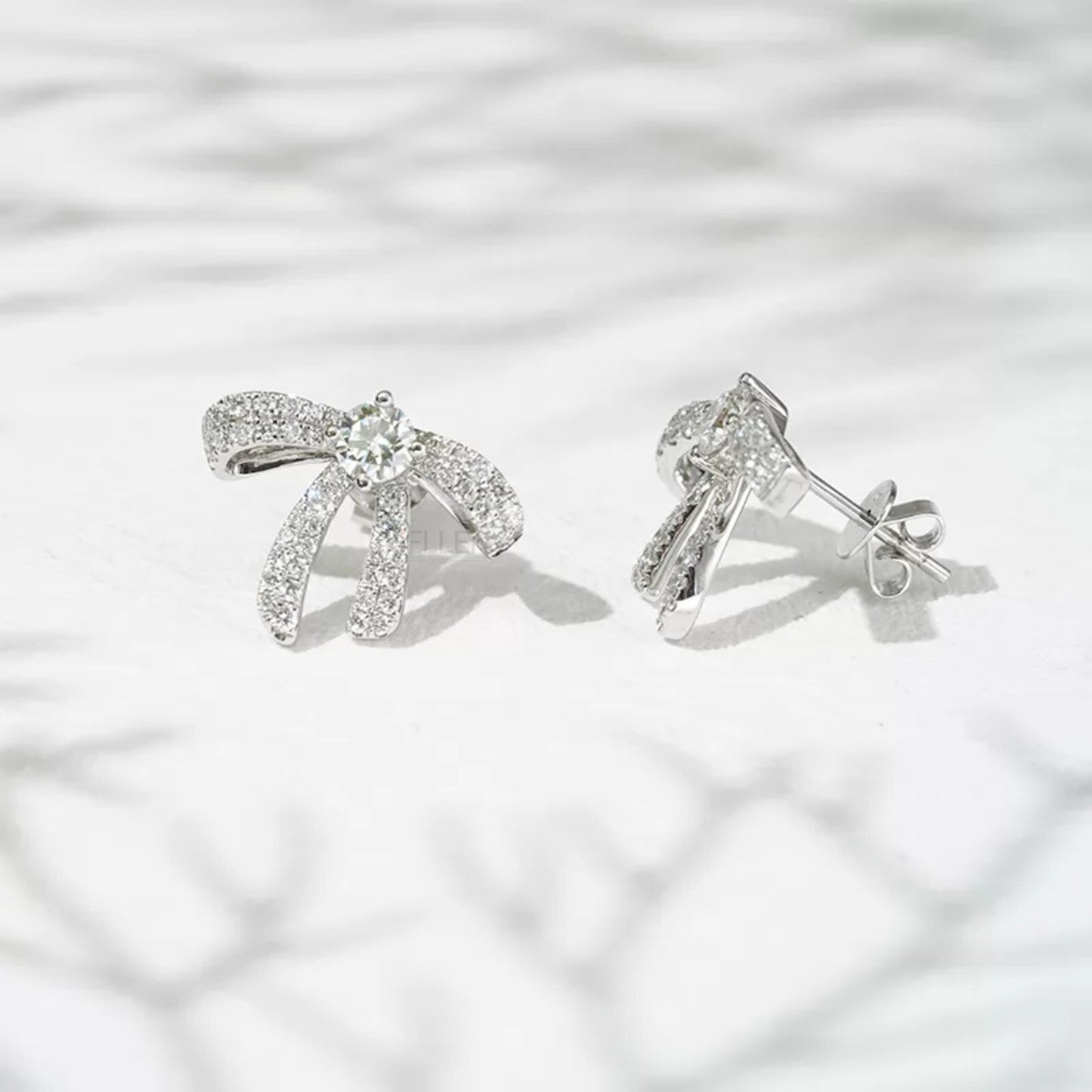 Elegance Silver Moissanite Ribbon Bow Stud Earrings