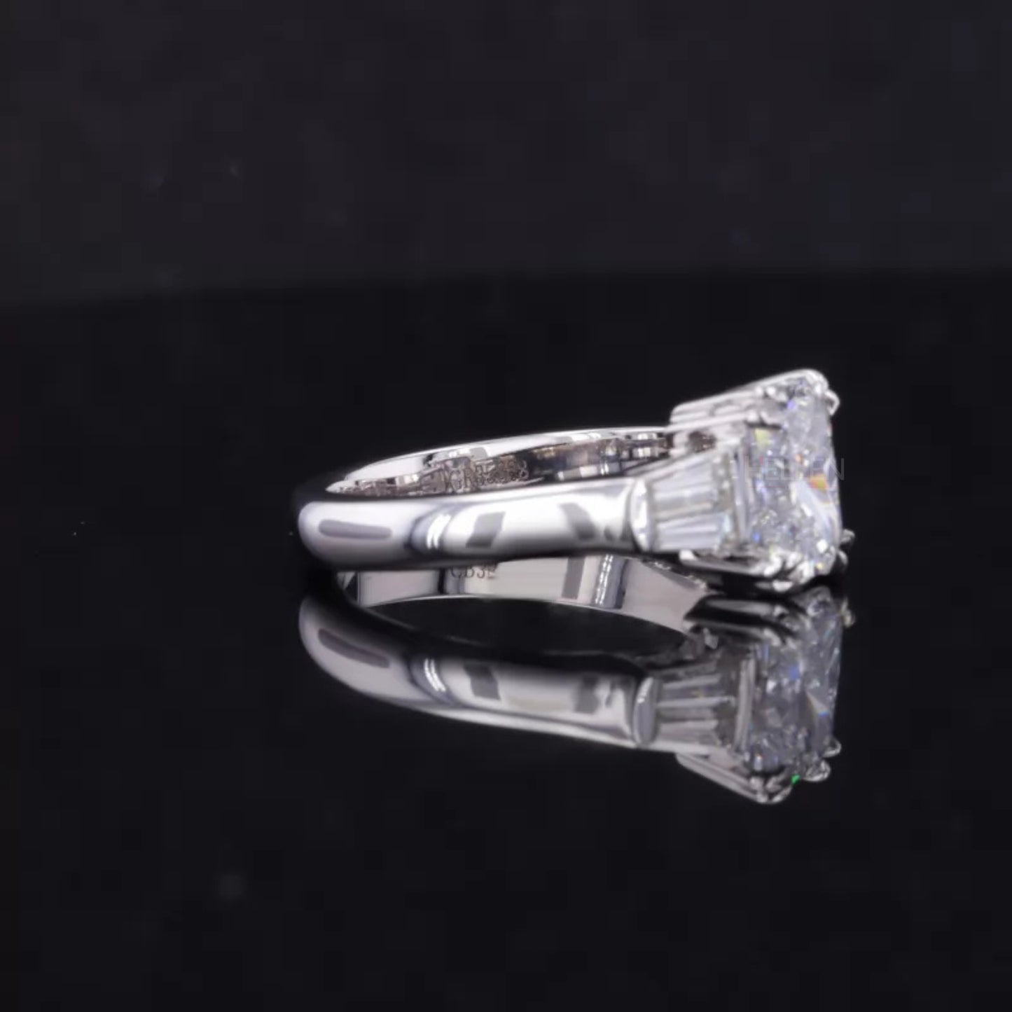 Emerald and Tapered Baguette 3 Stone Ring