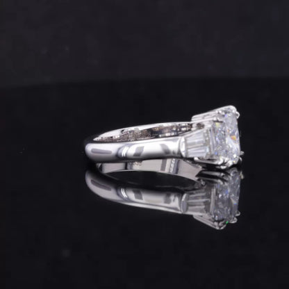 Emerald and Tapered Baguette 3 Stone Ring
