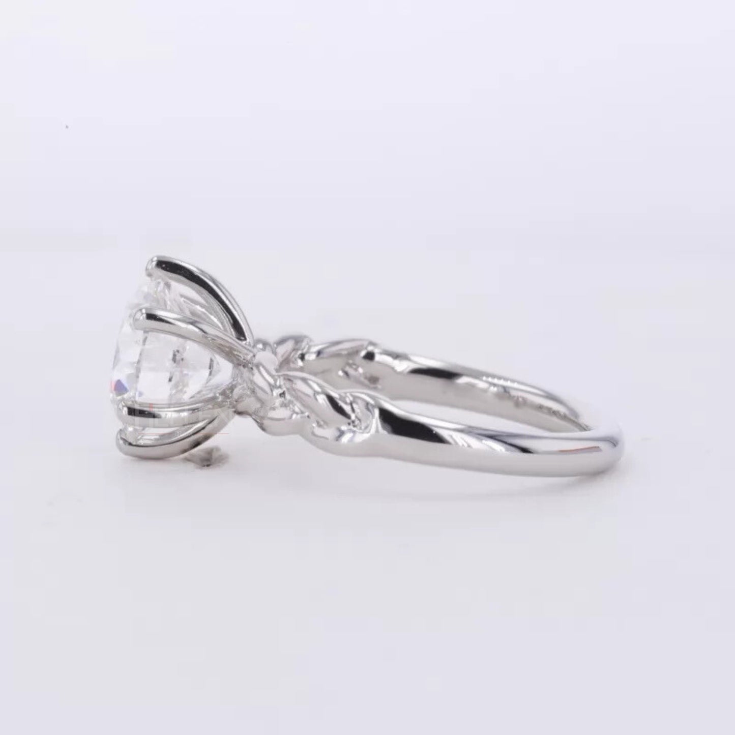 Twisted Shank Round Cut Moissanite Solitaire Engagement Ring