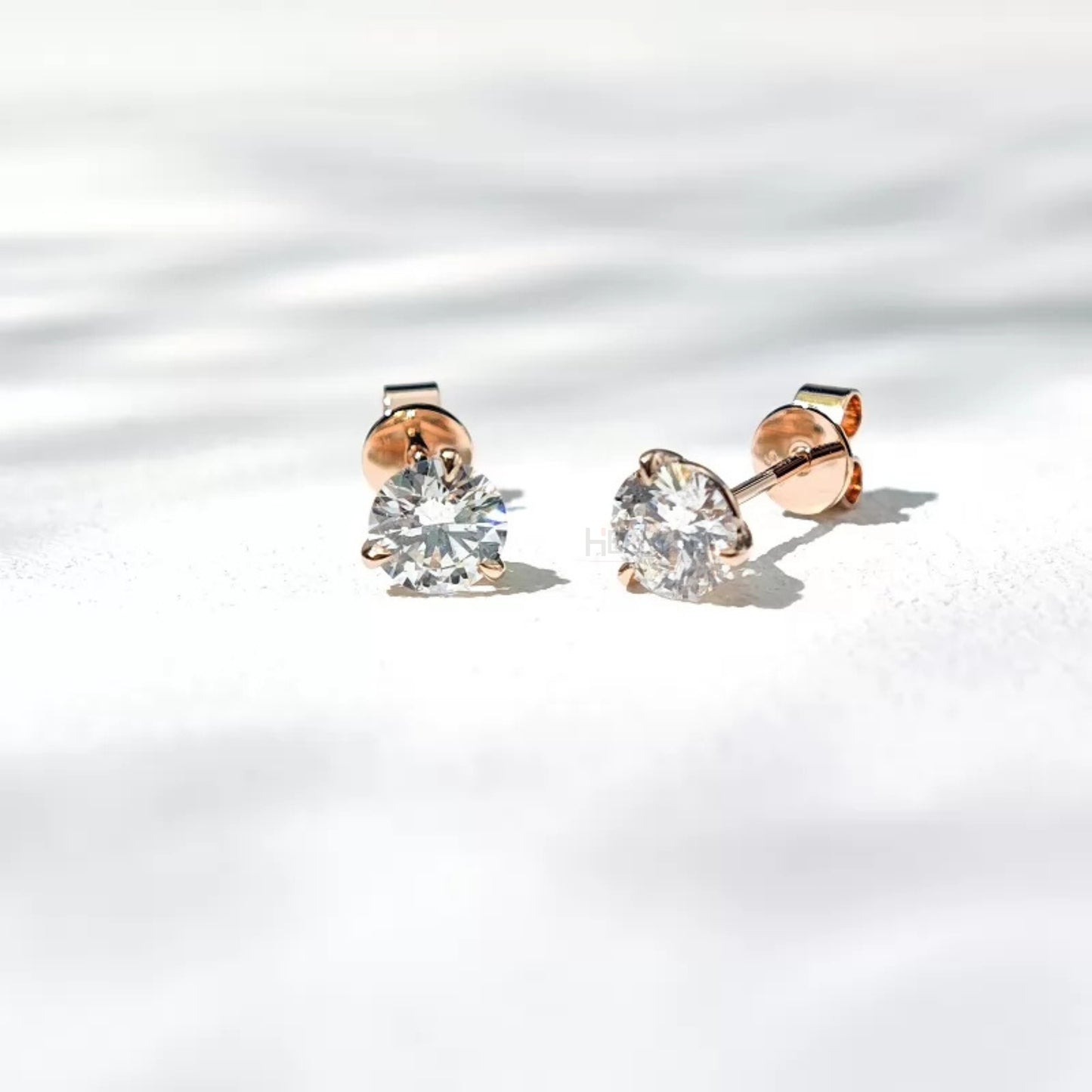 Round cut solitaire Moissanite sterling silver studs