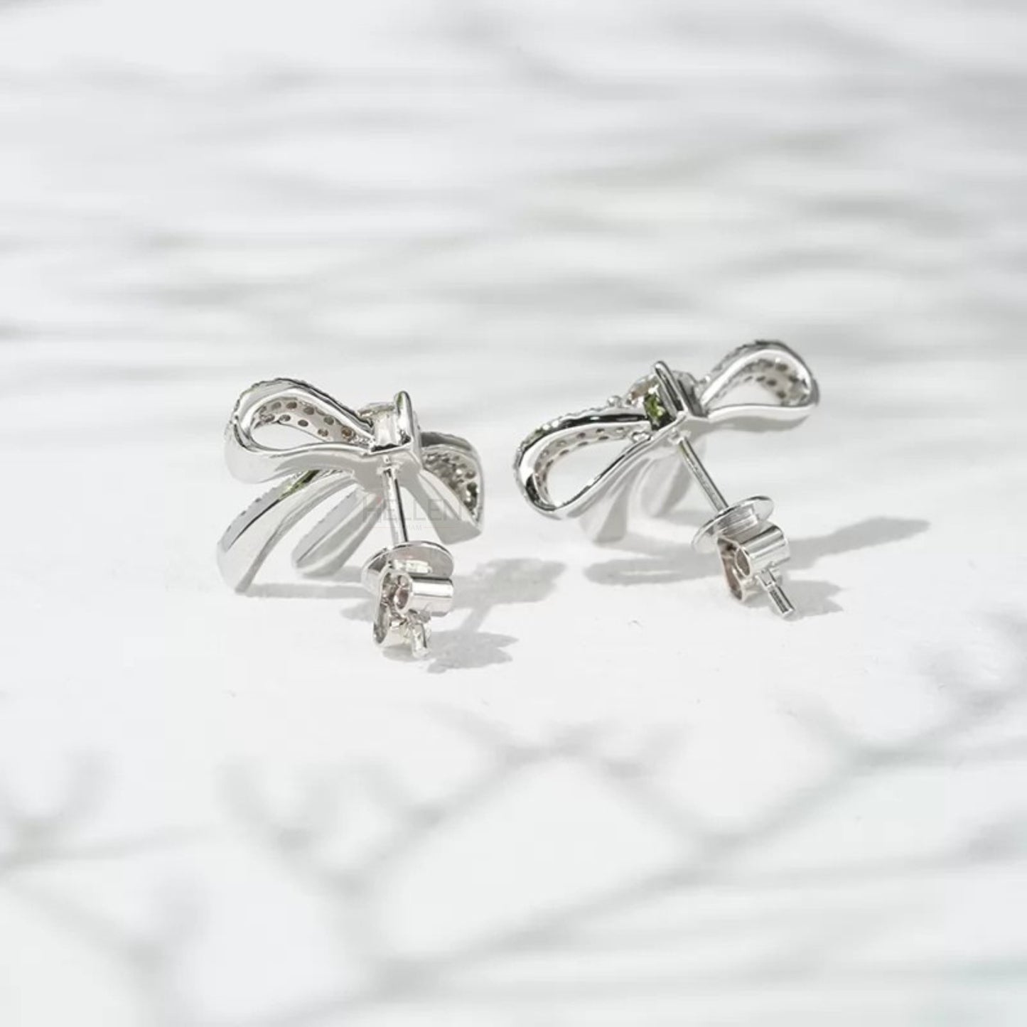 Elegance Silver Moissanite Ribbon Bow Stud Earrings