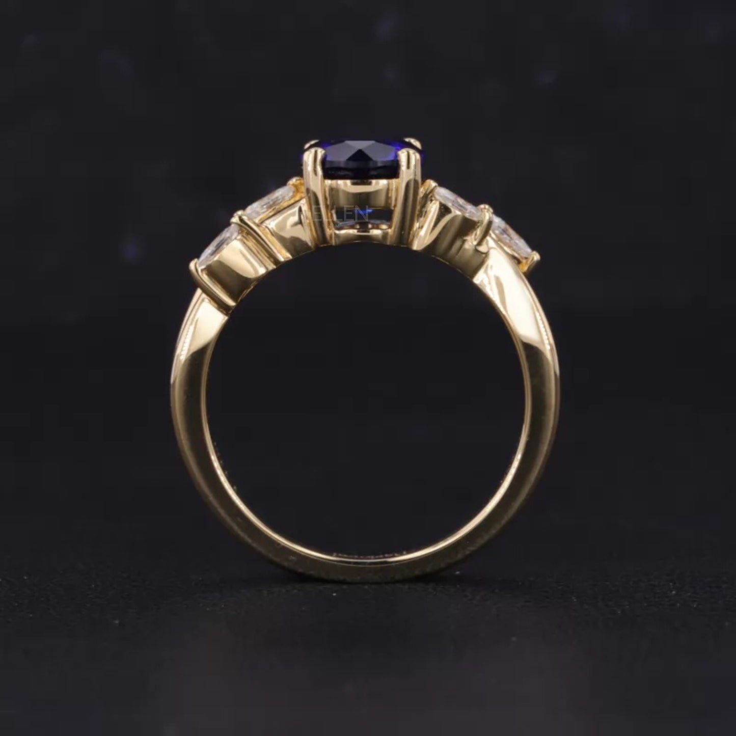 Blue Sapphire Round Cut Gemstone & Marquise Side Stone Ring