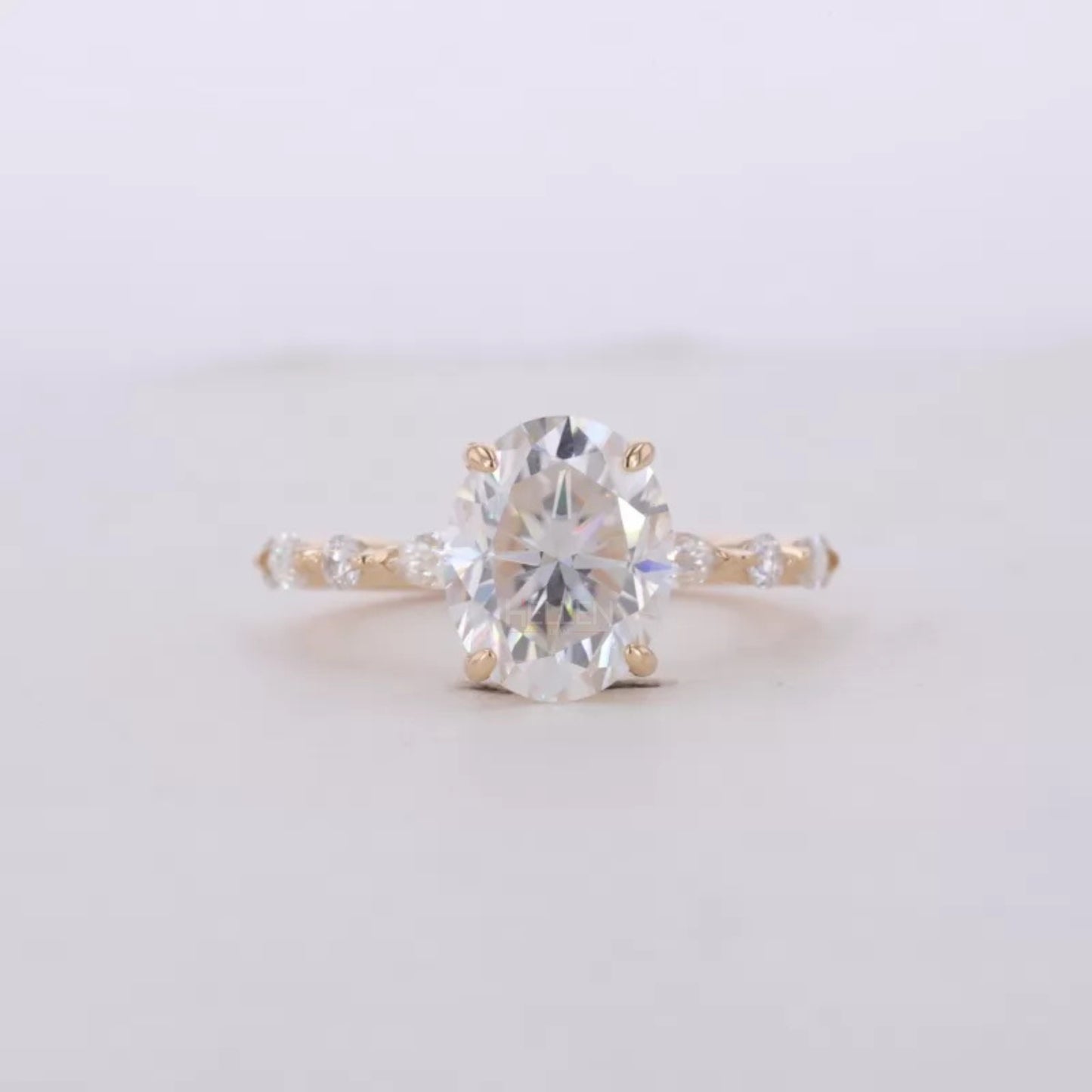 Oval Cut Solitaire with Marquise & Round Moissanite Band Ring