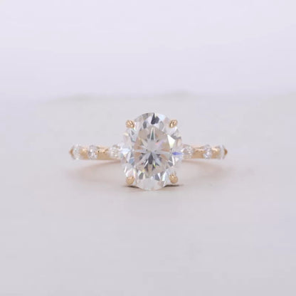 Oval Cut Solitaire with Marquise & Round Moissanite Band Ring