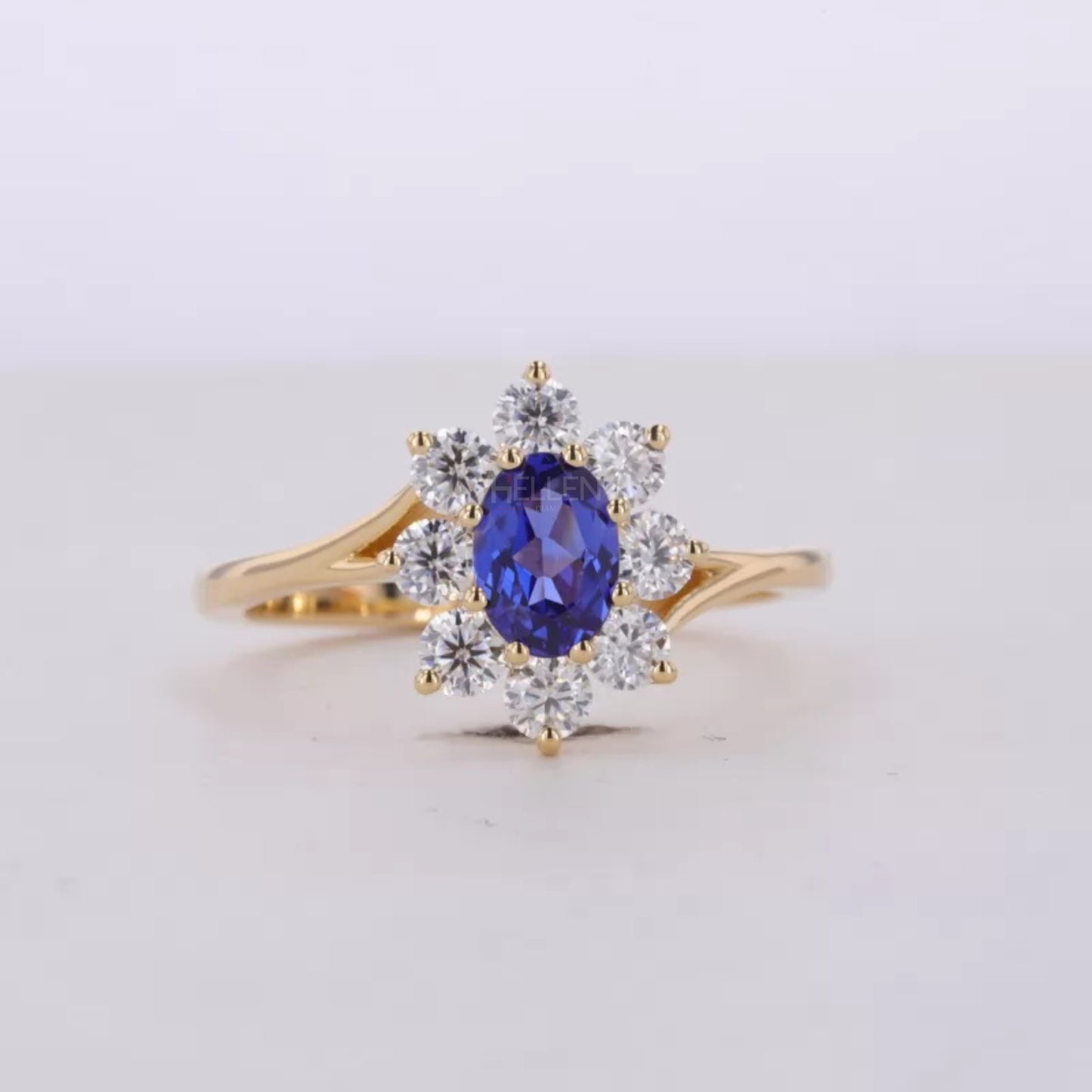 Blue Sapphire Oval Gemstone with Round Cut Halo Engagement Ring