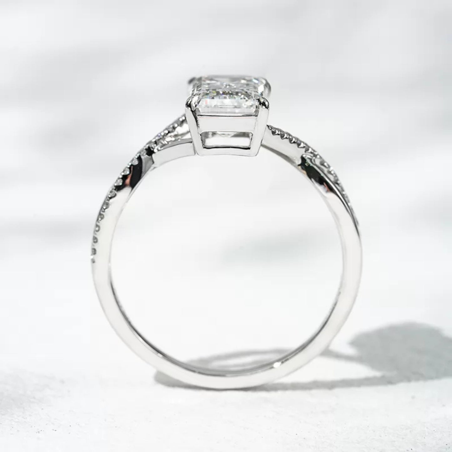Emerald Solitaire With Crossed Shank Wedding Ring