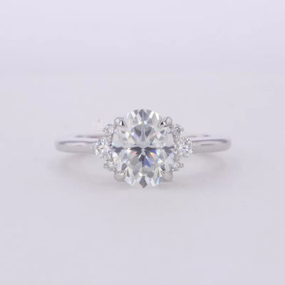 Floral Illusion Oval Cut Center & Round Side Moissanite Proposal Ring