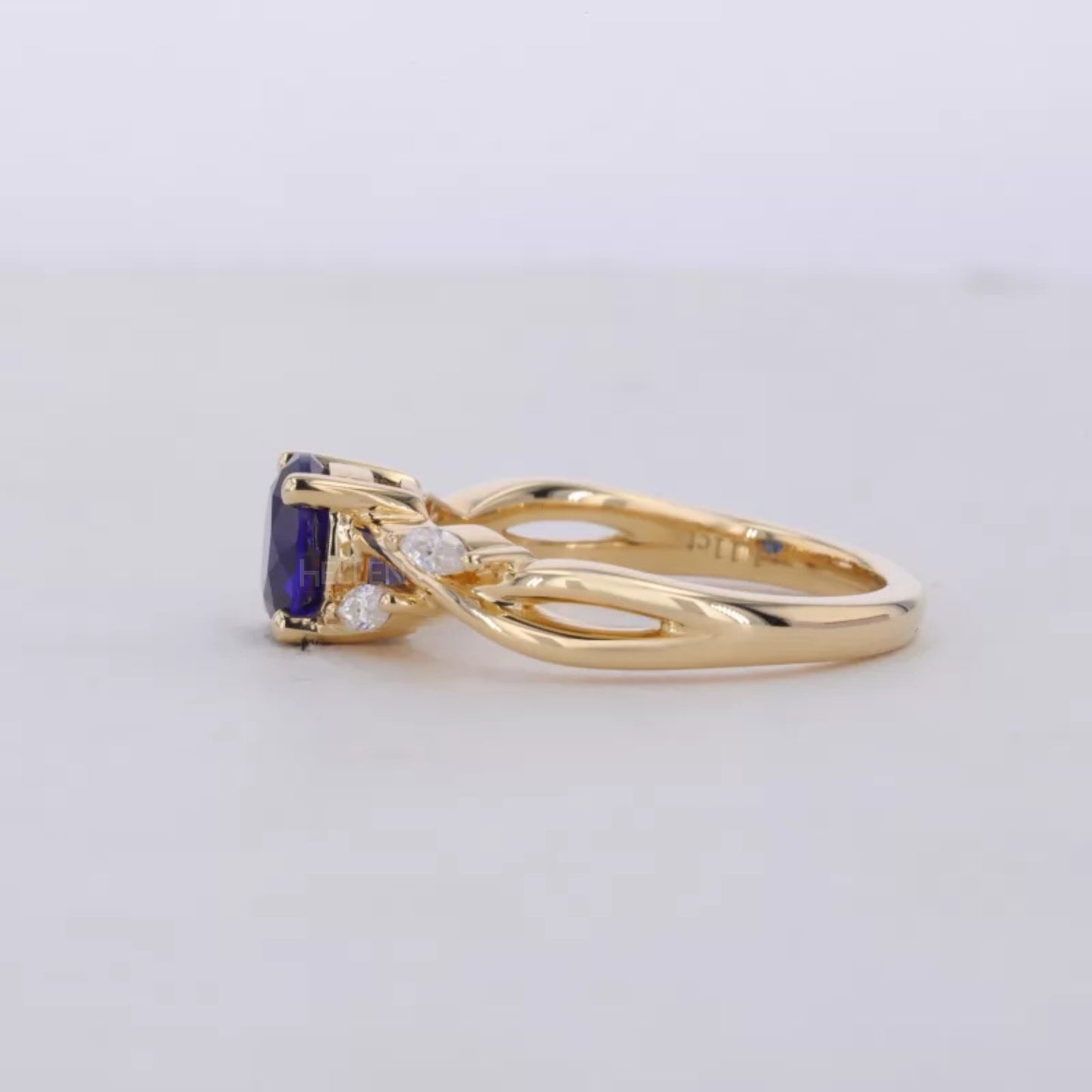 Blue Sapphire Round Cut Gemstone & Marquise Side Stone Ring