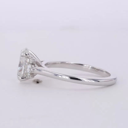 Floral Illusion Oval Cut Center & Round Side Moissanite Proposal Ring
