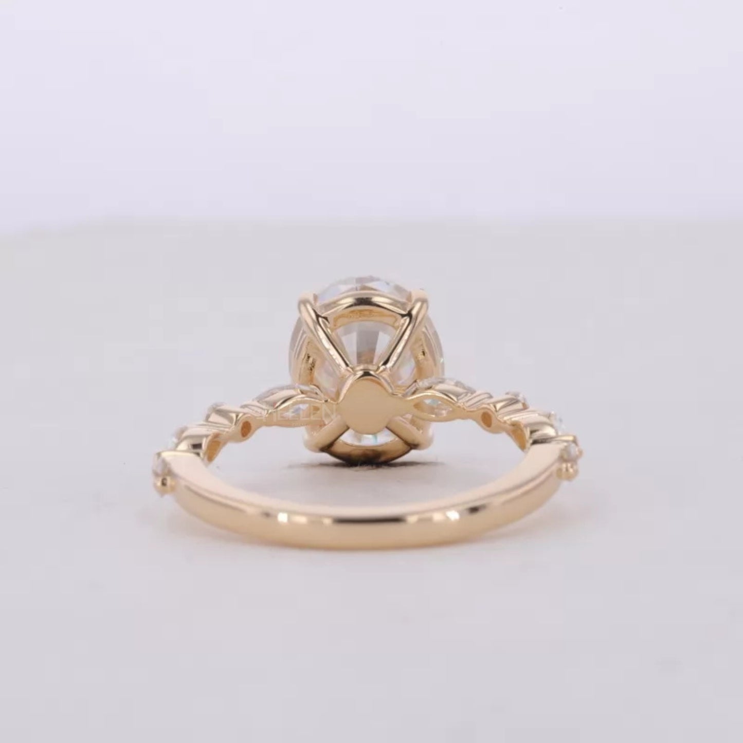 Oval Cut Solitaire with Marquise & Round Moissanite Band Ring