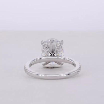Oval Cut Moissanite Solitaire with Diamonds on Tiger Prongs Ring