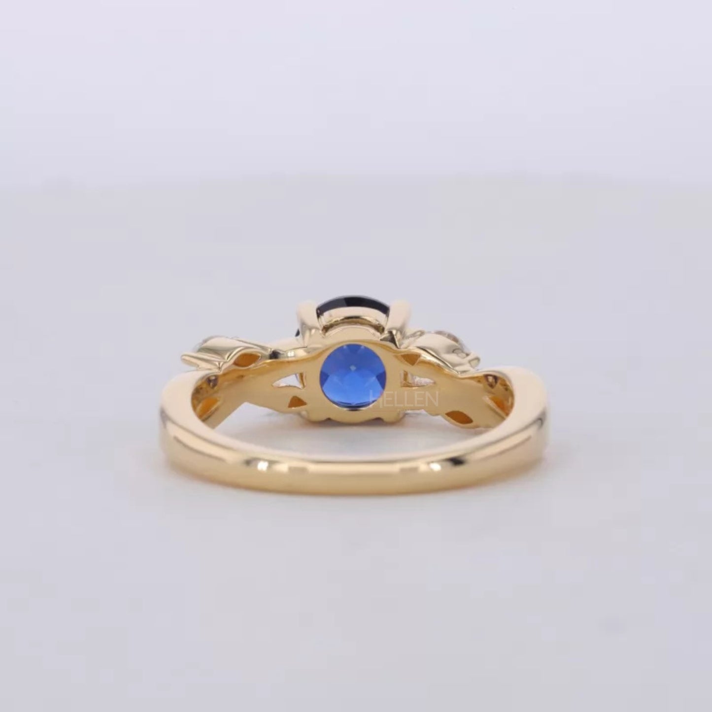 Blue Sapphire Round Cut Gemstone & Marquise Side Stone Ring