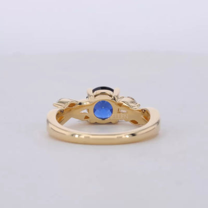 Blue Sapphire Round Cut Gemstone & Marquise Side Stone Ring