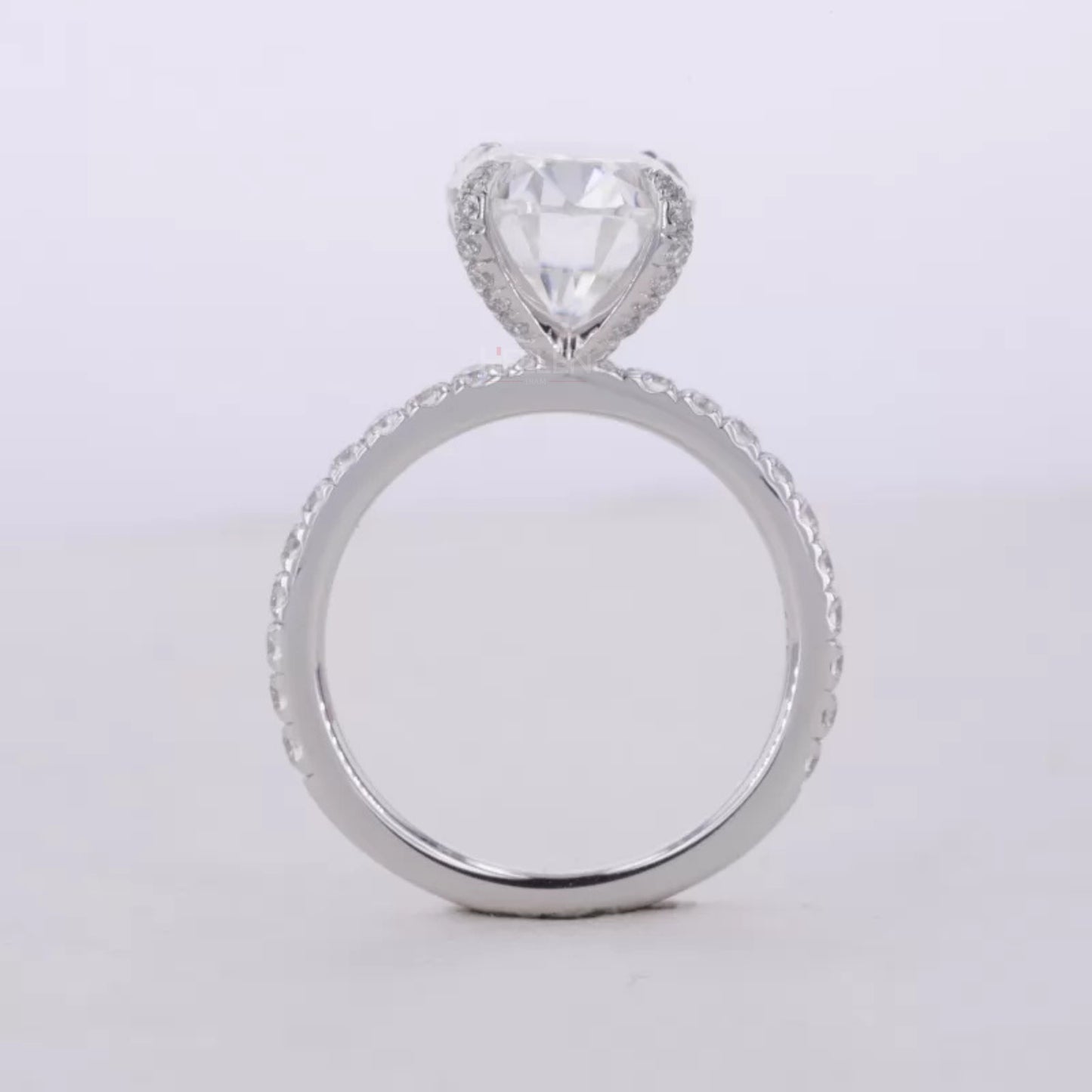 Oval Cut Moissanite Solitaire with Diamonds on Tiger Prongs Ring