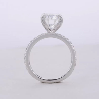 Oval Cut Moissanite Solitaire with Diamonds on Tiger Prongs Ring