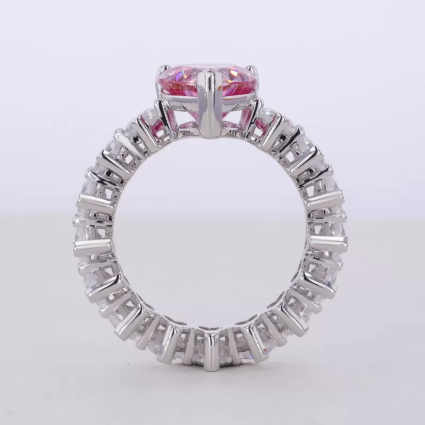 Pink Sapphire Heart Cut Solitaire & Moissanite Heart Shank Ring