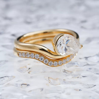 Pear Solitaire & Round Cut Moissanite Stackable Bridal Ring Set