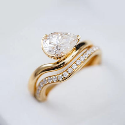 Pear Solitaire & Round Cut Moissanite Stackable Bridal Ring Set
