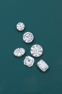 Collection of diamonds on a dark green background